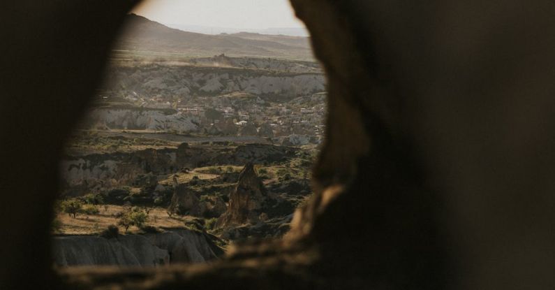 Budget Travel - A view of the city from inside a hole