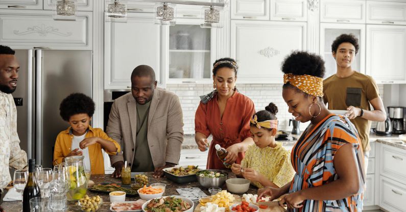 Holiday Cooking - Family Preparing Food in the Kitchen