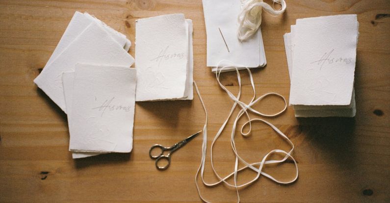 Recycled Crafts - A table with a bunch of paper and scissors